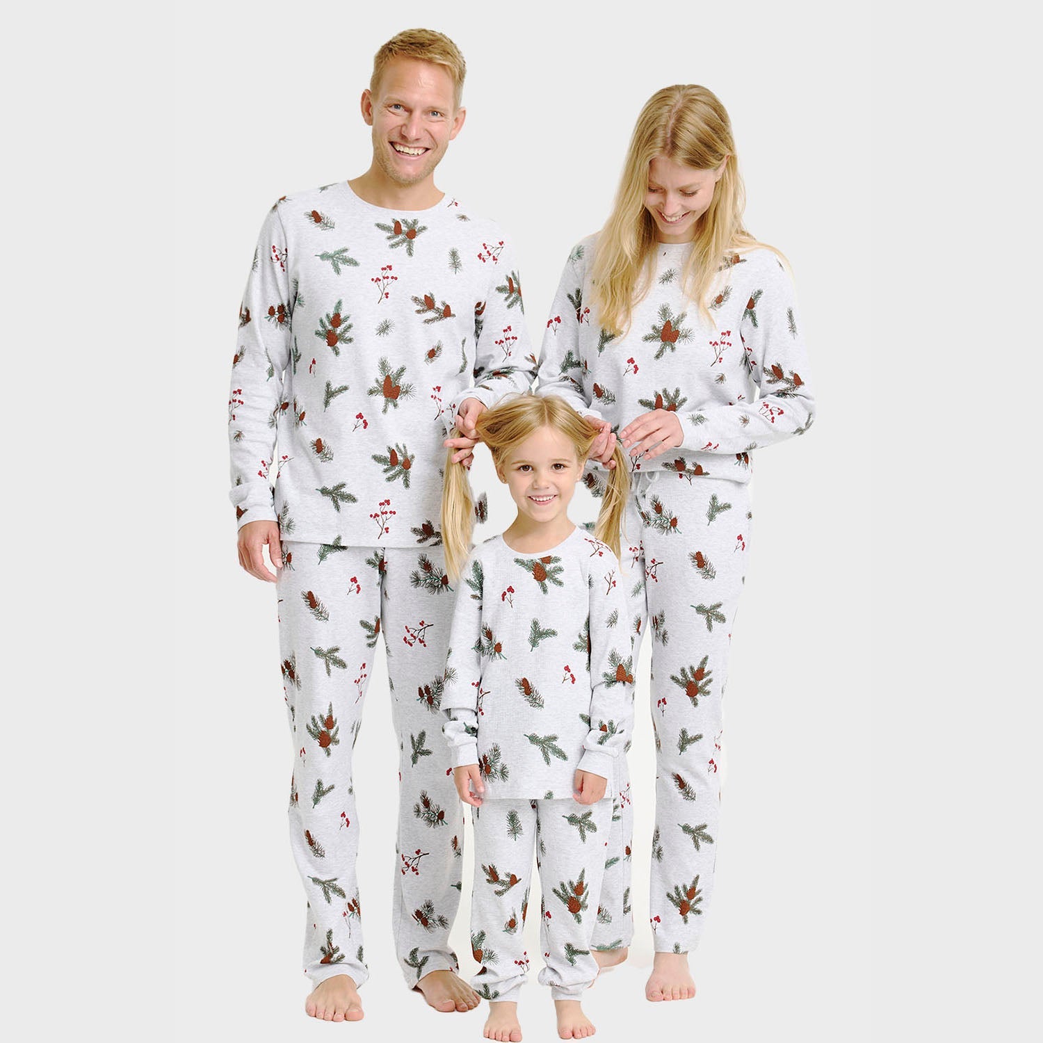 Weißer Weihnachts-Pyjama Damen Herren Kinder mit Lebkuchenmuster, nachhaltige Baumwolle.