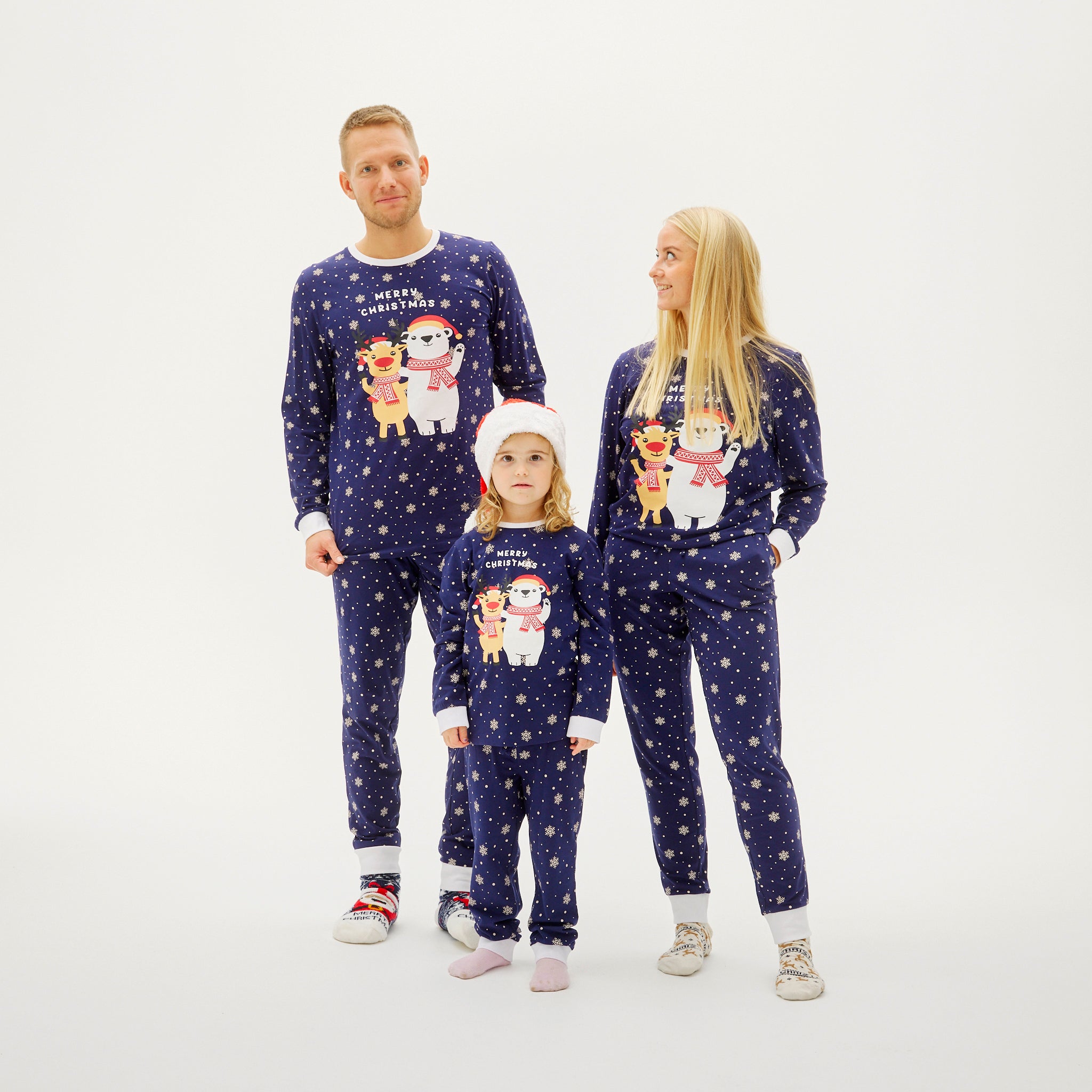 Dunkelblaue Weihnachts-Pyjamas für Herren, Damen und Kinder mit Schneemann-Motiv und Sternen, nachhaltige weihnachtspyjama.